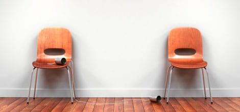 Tin can phones on chairs